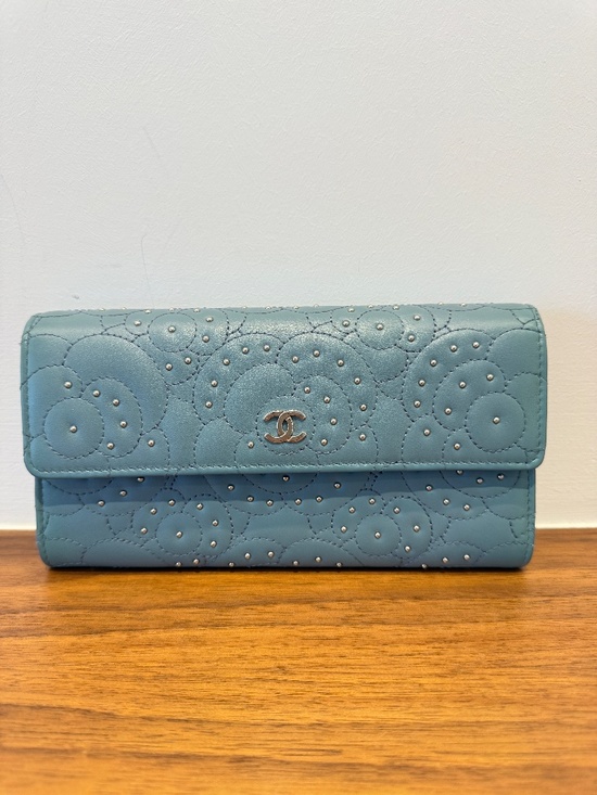 CHANEL Handbags - Chanel Lambskin Camellia Embossed Long Double Wallet with Studs in Blue